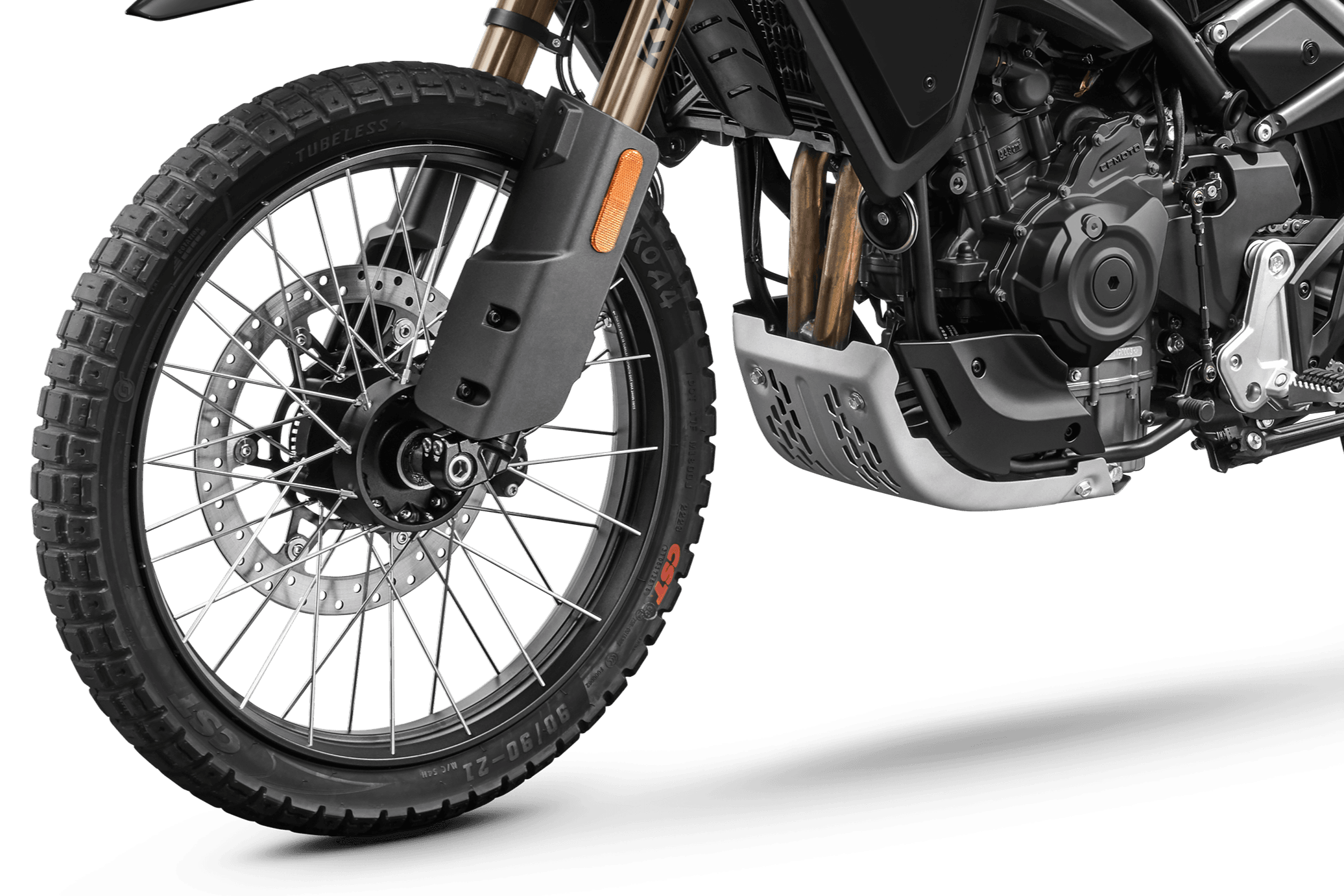 Front spoked wheel, CST tubeless tyre, brake disc, inverted fork, reflector and engine skid plate are clearly visible.